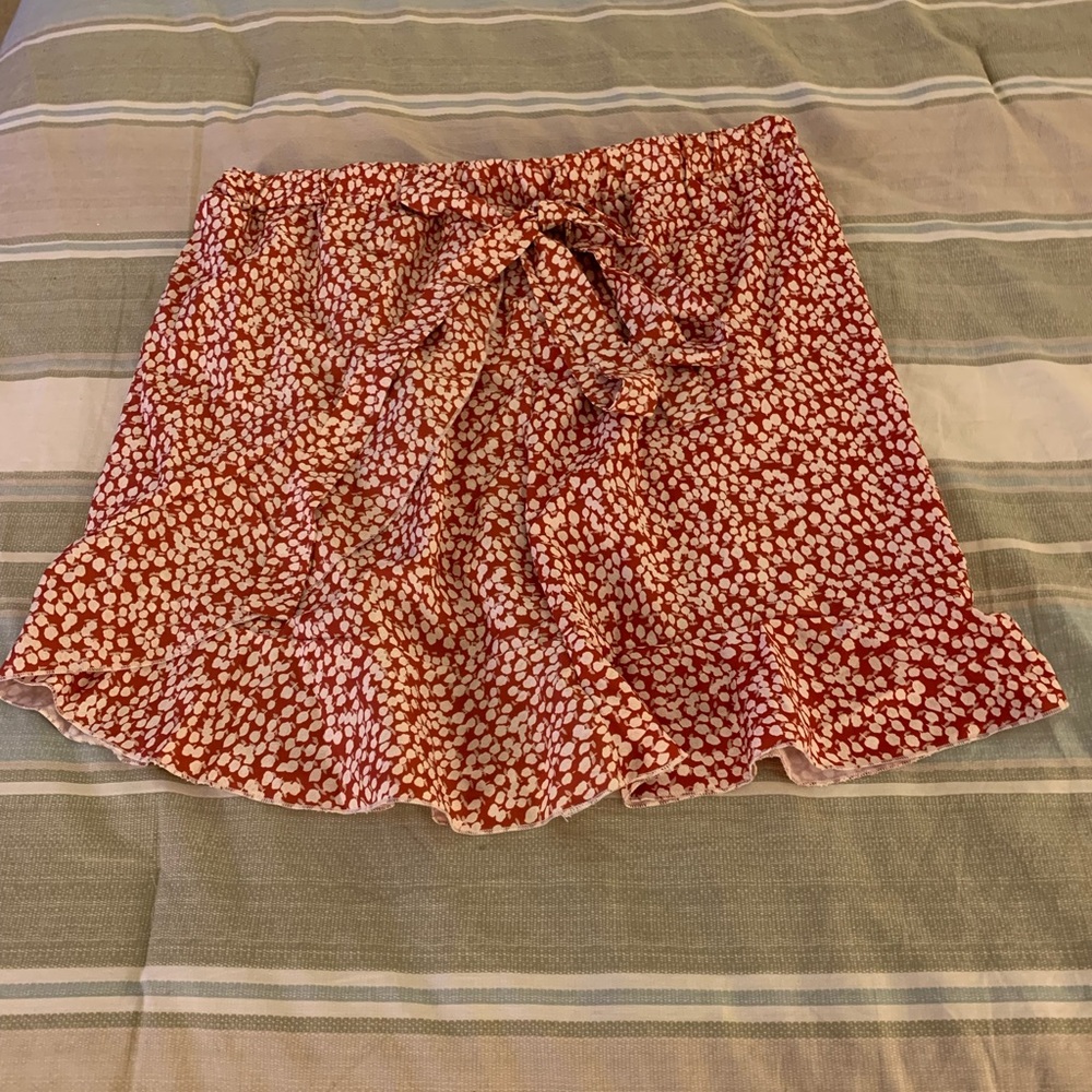 Burnt orange and white stretchy polka dot skirt with bow. XL
